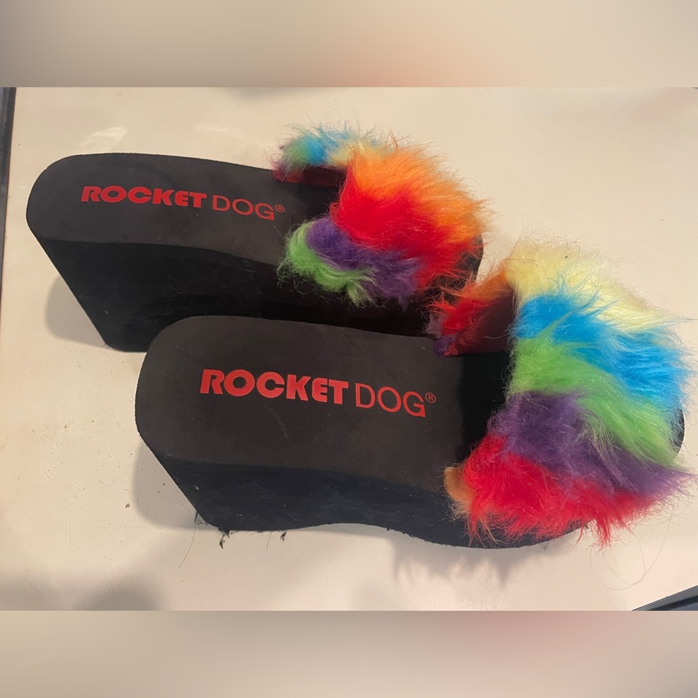 Rocket Dog fuzzy rainbow wedge platforms.